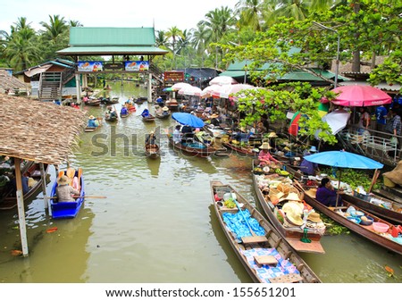 SAMUT SONGKHRAM, THAILAND - SEP 21:Local merchant sell food ,fruits and product at Thaka floating market,on September 21,2013 in Samutsongkhram,Thailand. Thaka is a popular tourist attraction.