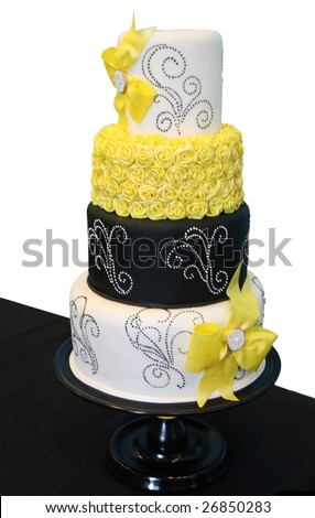 stock photo Black and White Patterned Wedding Cake with Yellow Roses