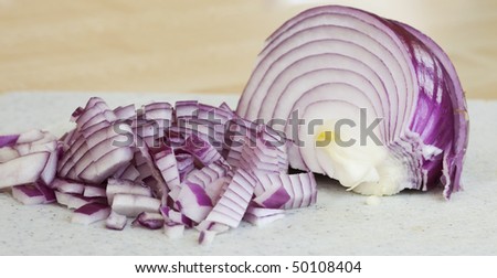 Diced Red Onions on a Chopping Board