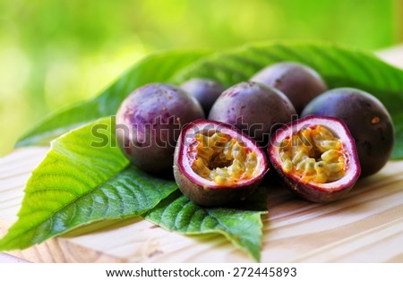 Passion fruits on wooden table