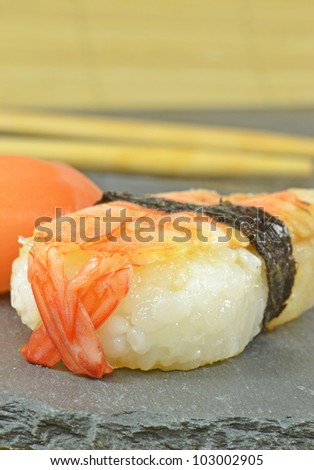 Close up of sushi on a stone plate