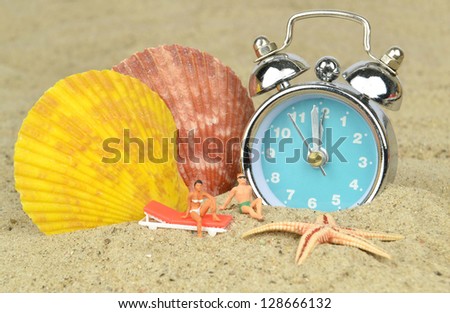 Last minute holiday concept with mini holiday makers relaxing next to a clock on the beach