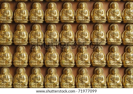 gold buddha on wall