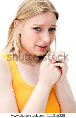 Sad woman with tissues on white background