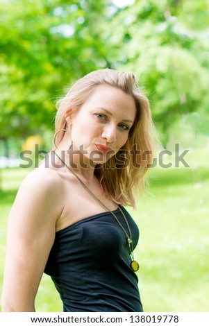 outdoor beautiful young woman having good time