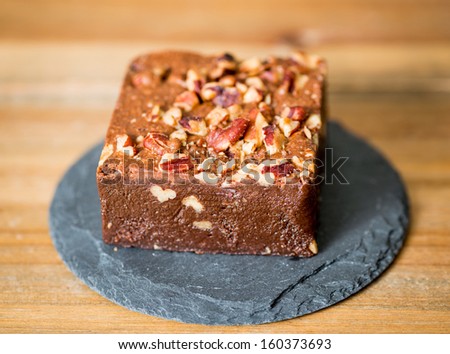 Chocolate Brownie cake on a dark plate