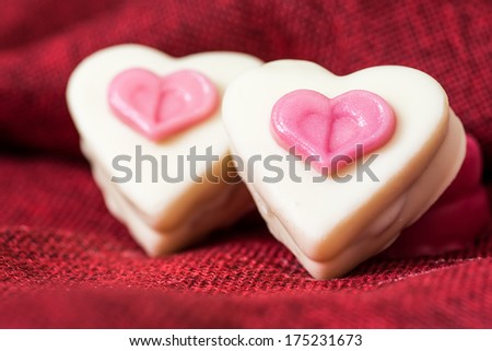 Composition for Valentine's day with small heart chocolates - ideal for your valentine's design