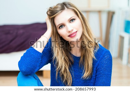 indoor beautiful smiling young attractive woman portrait