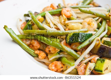 Fried shrimp-delicious fried shrimp with lettuce and rice in white plate