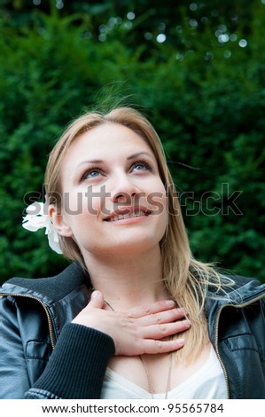 beautiful young attractive woman outdoors portrait of thinking woman