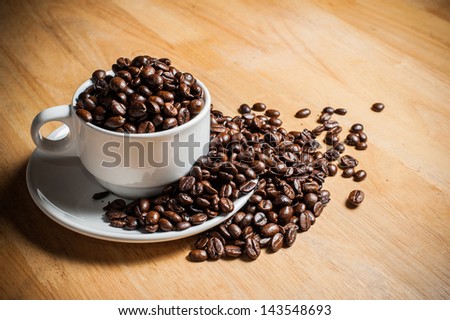 Coffee seeds on cup