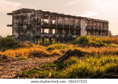 old ruined building in deserted field