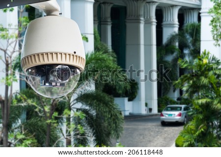 CCTV camera or surveillance operating at entrance of grand building