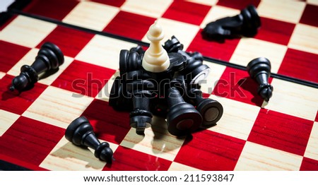 Chess board game showing the winner on white side business concept