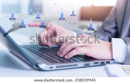 business man typing on laptop computer with human resource management concept