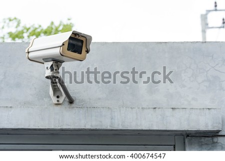 CCTV camera or surveillance installed on wall