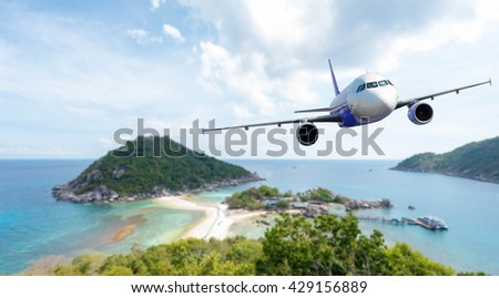 Airplane with background of beautiful ocean and island, Koh Nang Yuan in Thailand, exploration conceptual