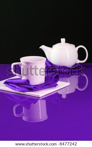 A modern home decor shot of a table set for tea
