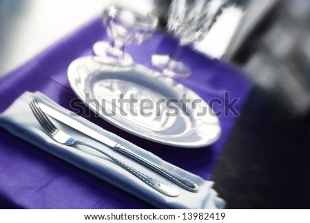 A table set for a fancy dinner with special effect and special focus
