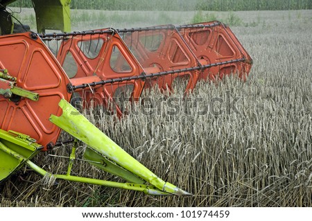Photo of combine harvesting crops