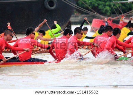 BANGKOK ,THAILAND-AUG 25 : Unidentified rowers in full speed during Thai Long Boat Competition for Long Boat tradition legendary Championship on August 25, 2013 in Bangkok,Thailand.
