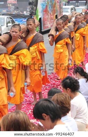 BANGKOK,THAILAND-APRIL 3: Monks walking for praying to king of Thailand on April 3, 2012 in  Bangkok,Thailand . 90% of the Thai  population is Buddhist