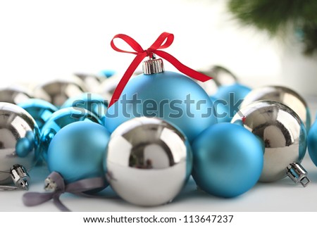 Blue Christmas Ornaments On A Table. Shallow DOF.