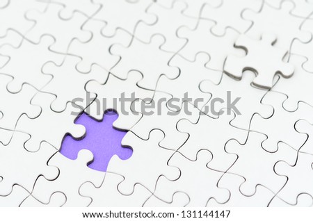 Plain white jigsaw puzzle. (light purple background)