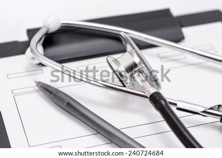 Stethoscope of medical equipment, and medical records.