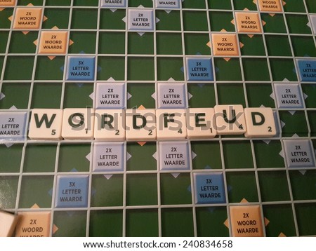 Elspeet,  The Netherlands, 31 December 2014 - Scrabble game board with the word mark Wordfeud.
