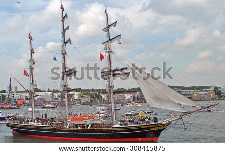 AMSTERDAM, THE NETHERLANDS, 19 AUGUST 2015 - Old tall ships sailing into the Port of Amsterdam during Sail 2015.