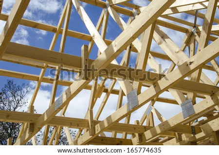 Inside wooden frame of a house under construction