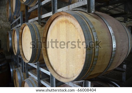 Wine barrels in storage at a winery in the Adelaide Hills, South Australia.