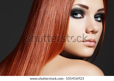 Health, beauty, wellness, haircare, cosmetics and make-up. Beautiful fashion hairstyle. Woman model with shiny straight long hair and evening make-up