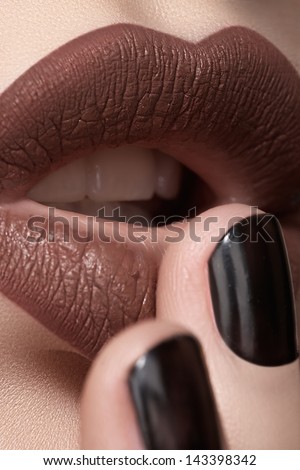 Close-Up Of Woman\'S Lips With Fashion Hot Chocolate Lipstick Makeup. Beauty Macro Sexy Make-Up With Black Coffee Color On Nails