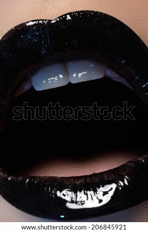 Black lips. Macro beauty shot.