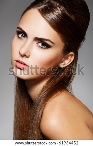stock photo Beautiful woman with long shiny hair in model pose