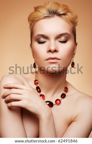 Beauty, fashion and personal accessories. Luxury sexy woman model with natural beige make-up, elegant hairstyle and chic jewelry