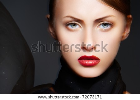 Model with chic red lips makeup Real