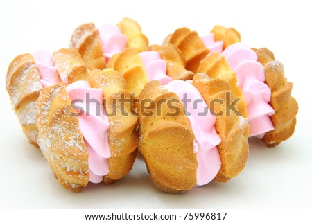 Yellow cookies with a  stuffing  on a white background