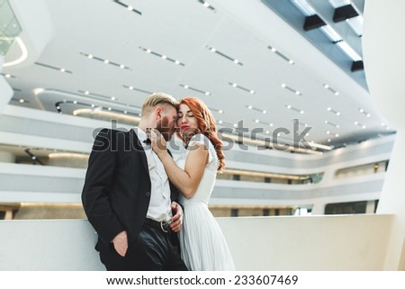 Wedding couple in a futuristic building