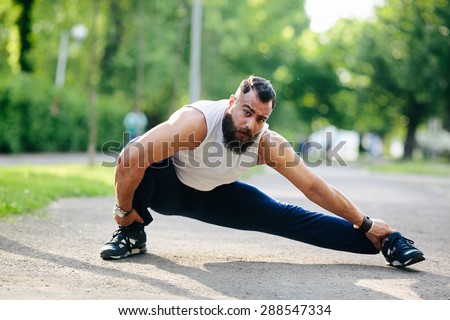 bearded man perform various exercises and stretches