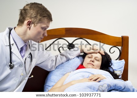 doctor treats a patient at his home
