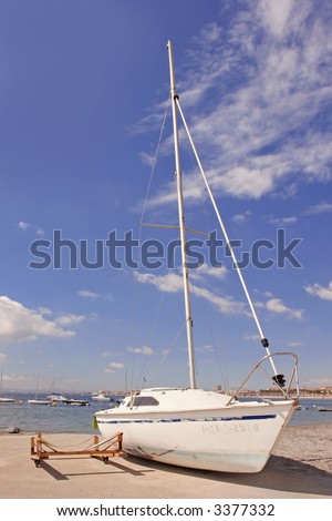 a yacht parked on a pathway waiting to set sail