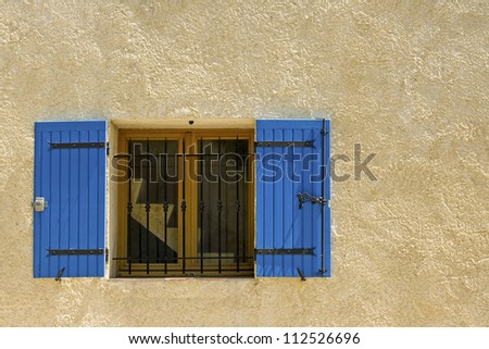 Blue shutter, on french cottage, House in French Village. Provence.