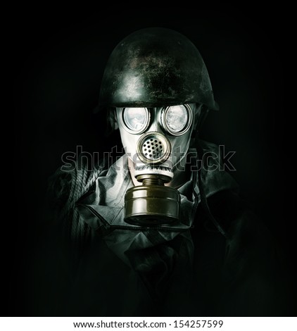 Concept. environmental protection. Man in gas mask