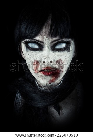 Scary zombie woman  with white eyes and bloody mouth