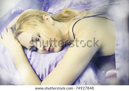 Sleeping beauty woman in silk Bed alone closeup in morning