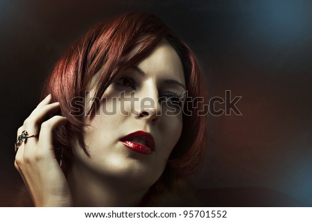Glamour portrait of sexy woman face with bright evening make up for party and jewelry gold rings with precious stones