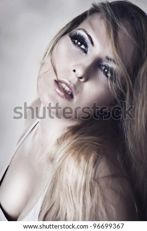Sexy female face with open mouth and long lashes